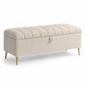 Banc de rangement en tissu lin beige avec pieds en métal doré