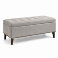 Banc de rangement en tissu lin gris clair avec pieds en bois